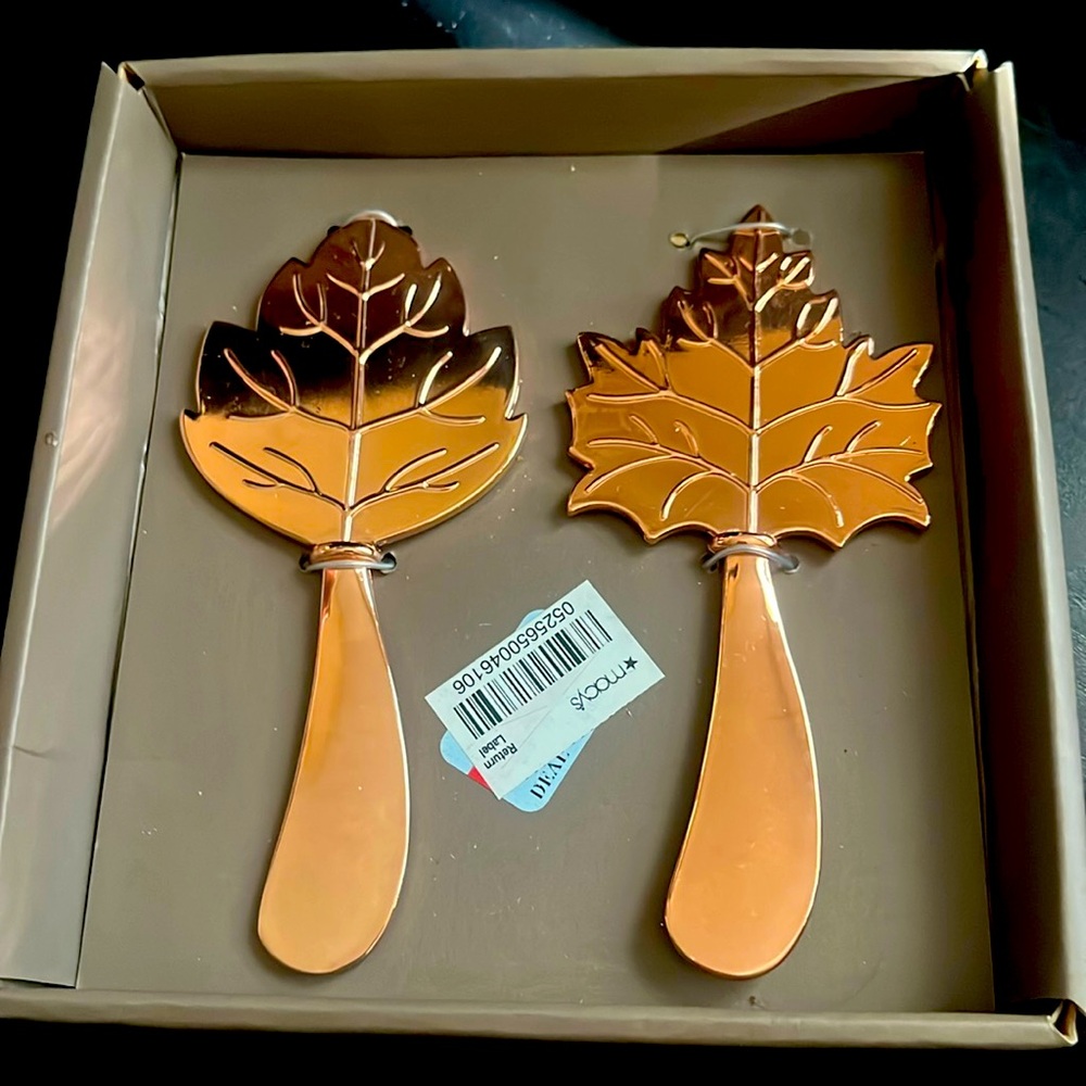 Macy’s copper/rose gold tone spreaders
